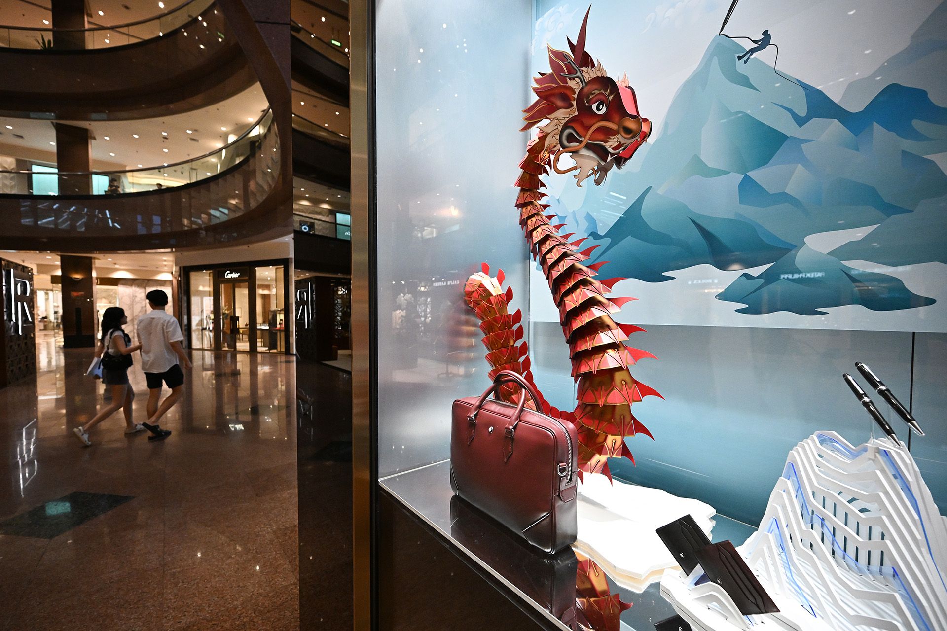 A paper dragon sculpture in a showcase at Montblanc Boutique in Ngee Ann City. ST PHOTO: LIM YAOHUI