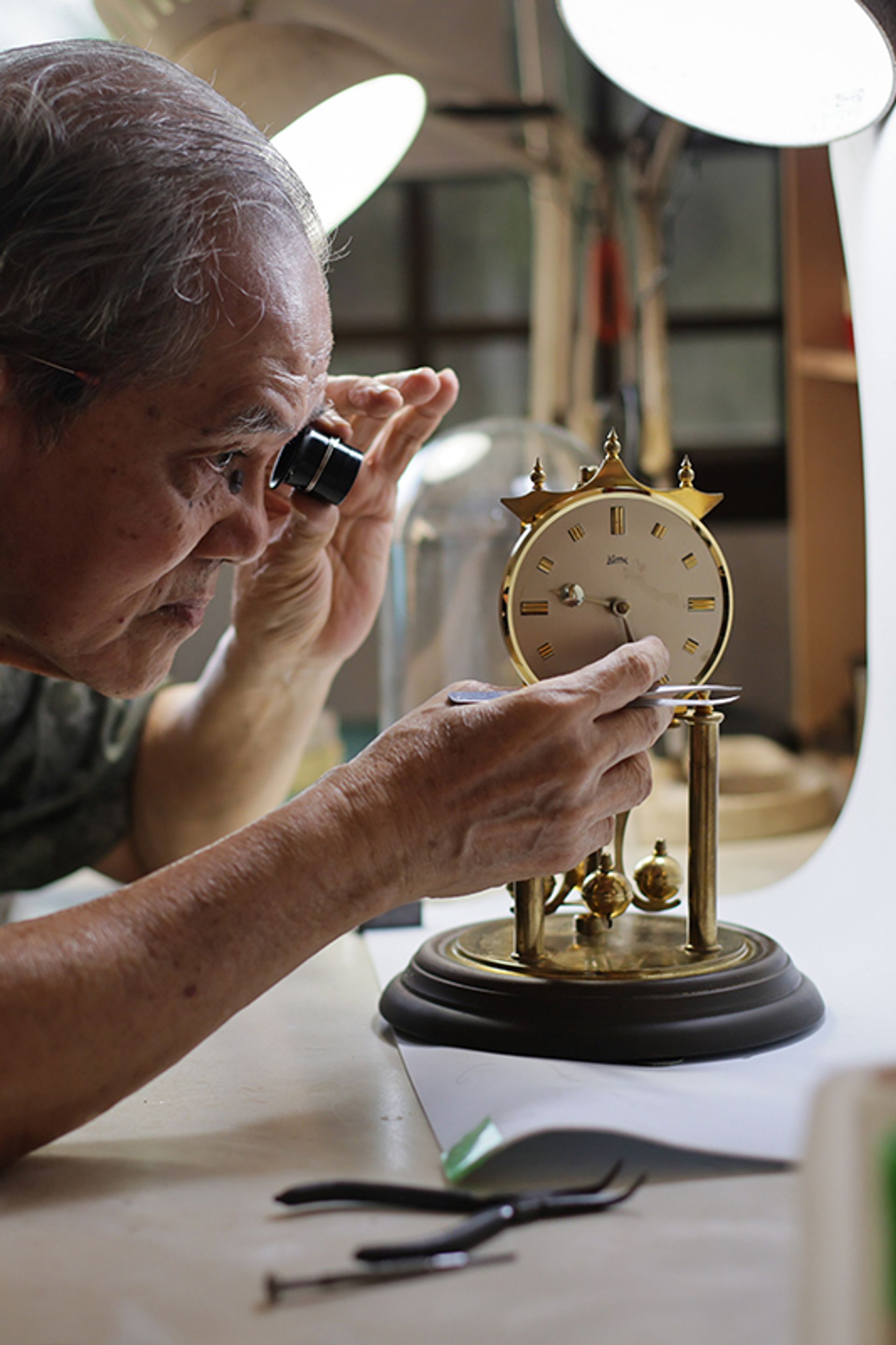 A Koma clock, a gift from his friend, was the first 400-day clock that Mr Mun repaired.