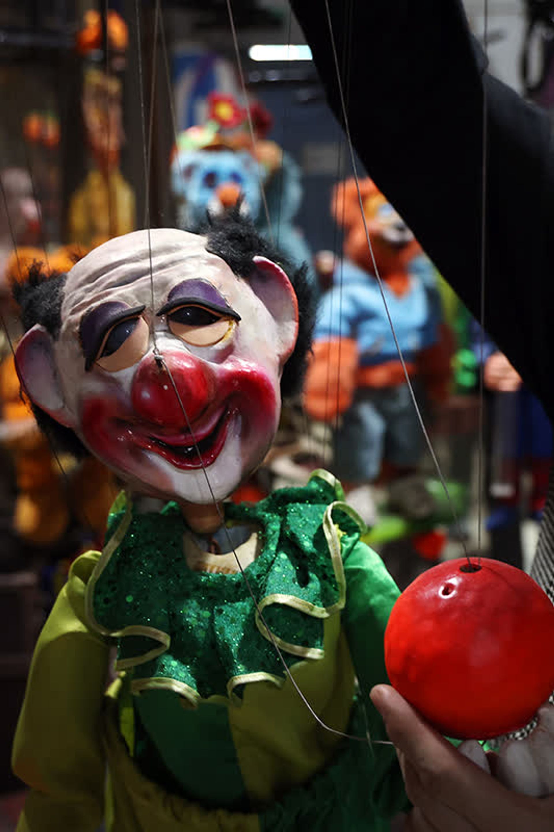 Mr Yeo holding his favourite puppet Bruno the clown, the first string puppet he created that worked.
