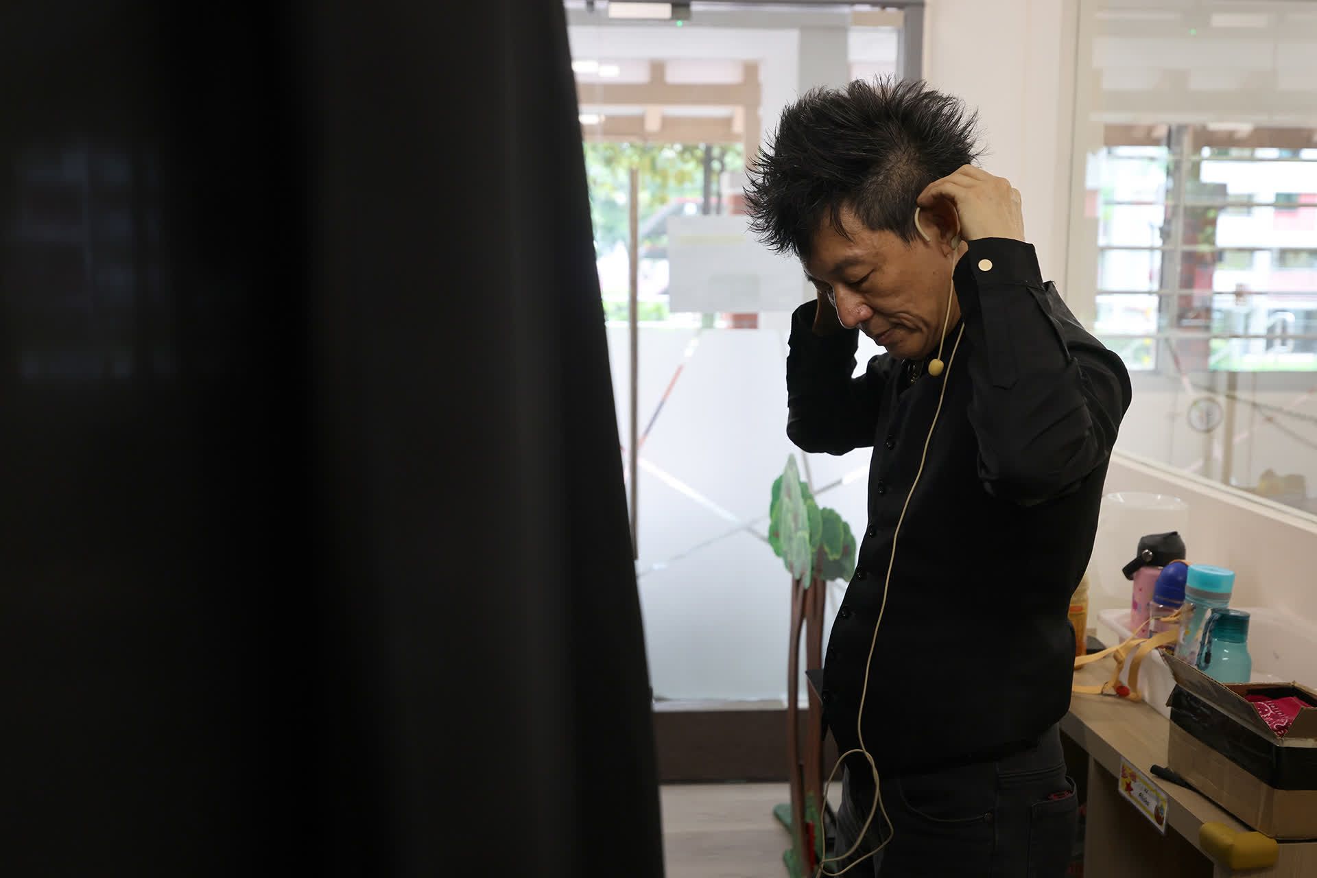 Mr Yeo getting ready to perform for children at Little Olive Tree pre-school in Ang Mo Kio on June 19, 2024.